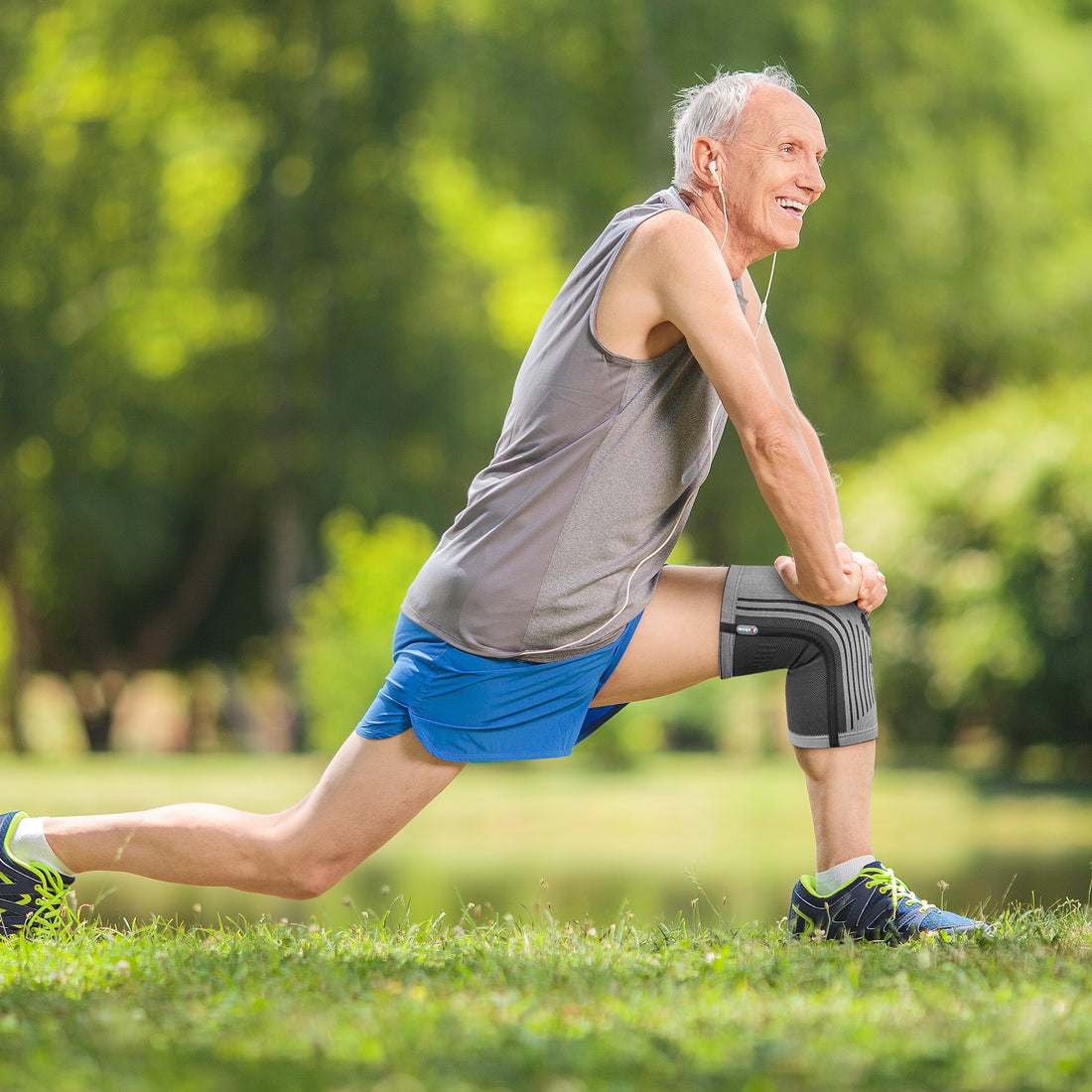 An Old Man Doing Exercise With A New Knee Brace In The Park