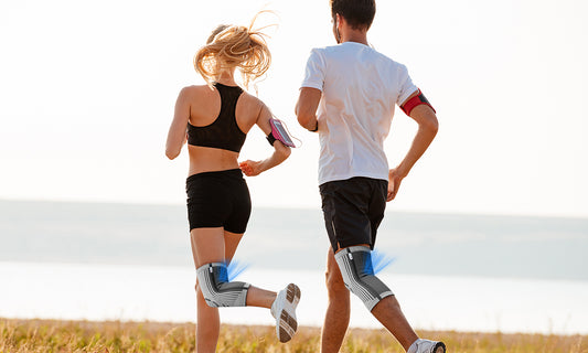 A Couple Wear High Quality Knee Sleeves Running Along the Lake