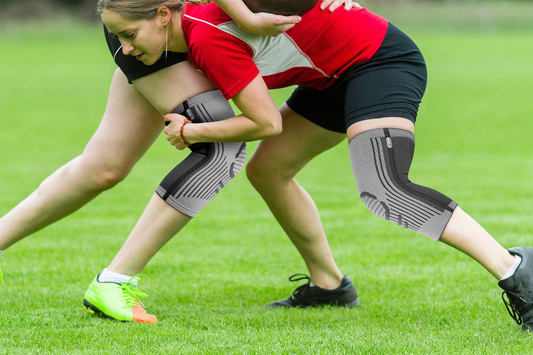 Two Girls Wear the Same Comfort Knee Brace When Playing Basketball 