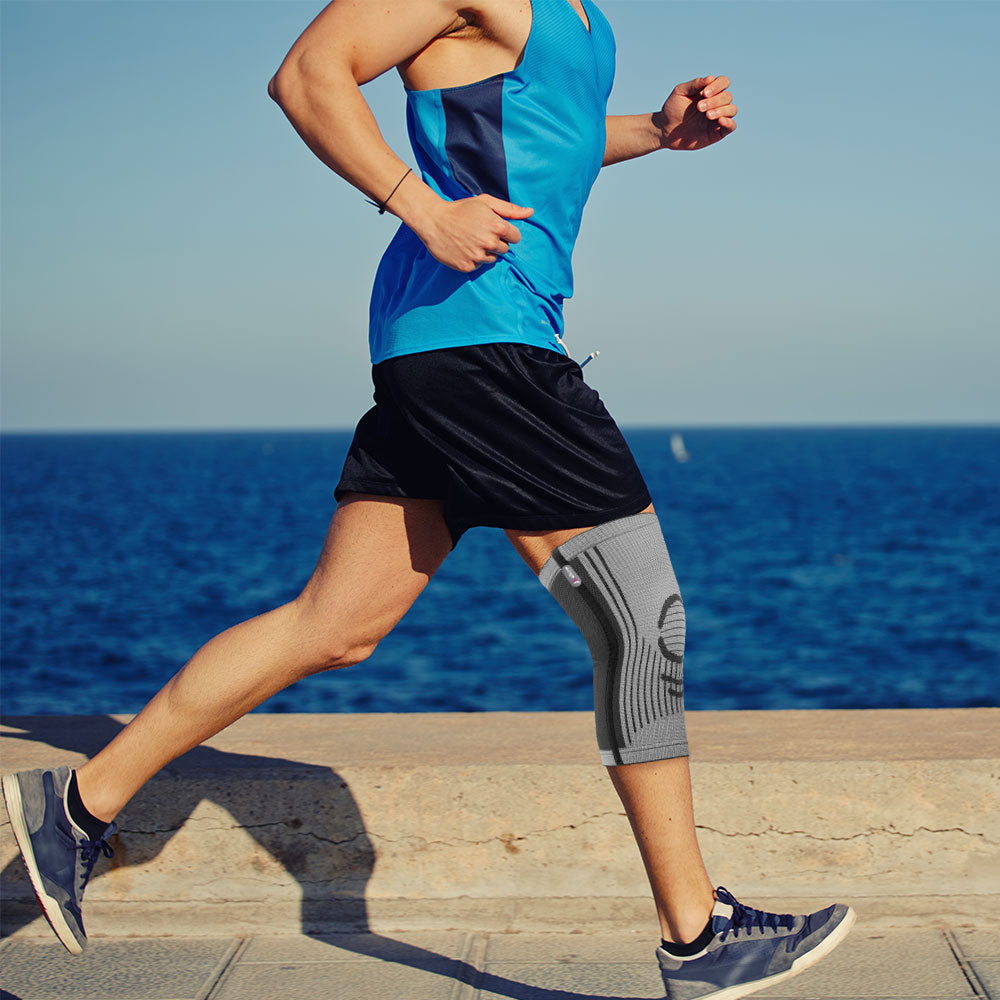 A  Man Wear a Knee Sleeve in His Right Leg When Running