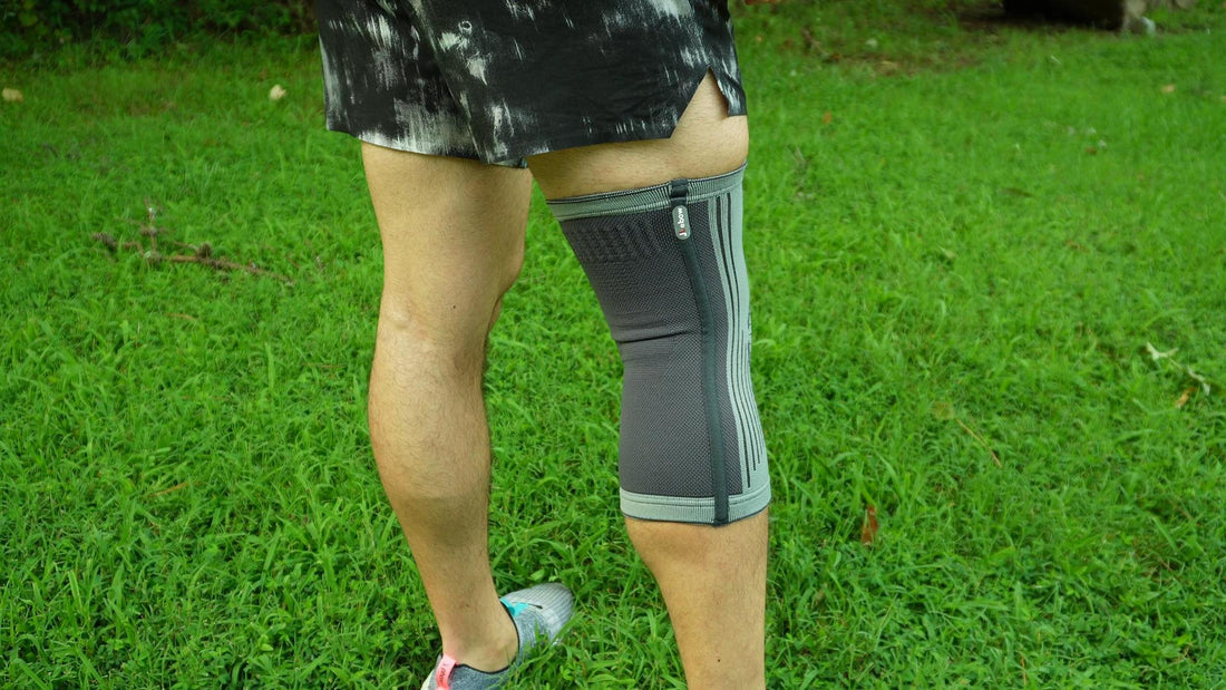 A Man Wearing A High-quality Knee Sleeve When Exercise