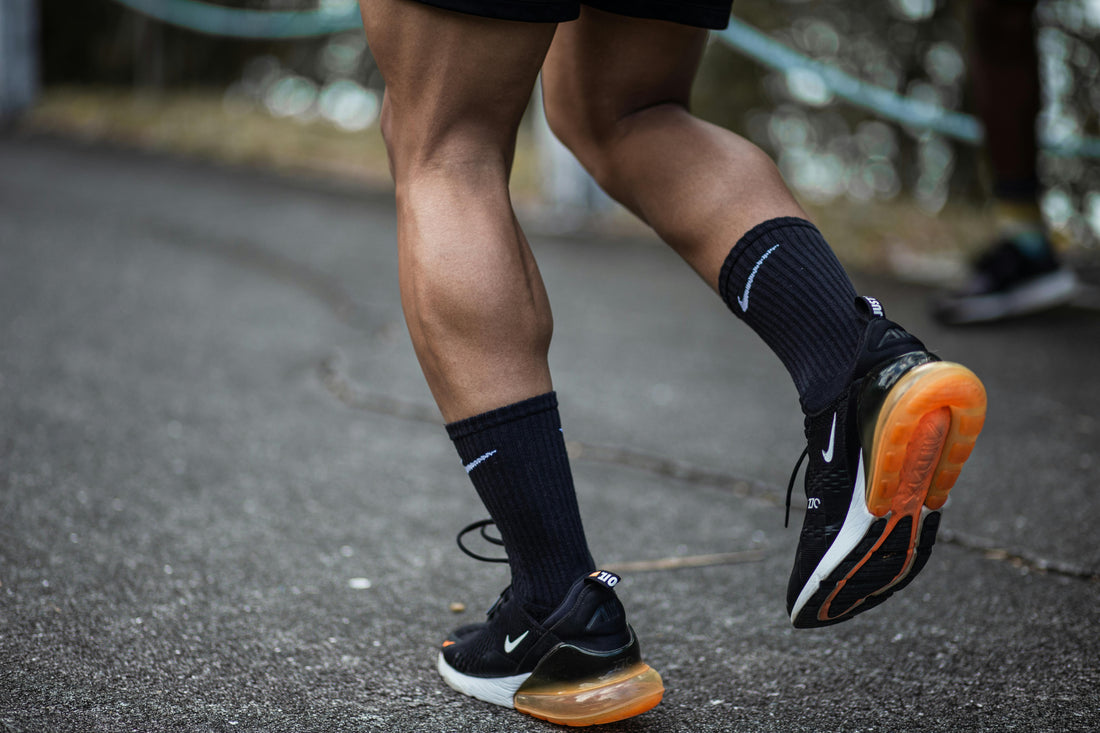 A Man Running Without Wear A Useful Knee Sleeve.